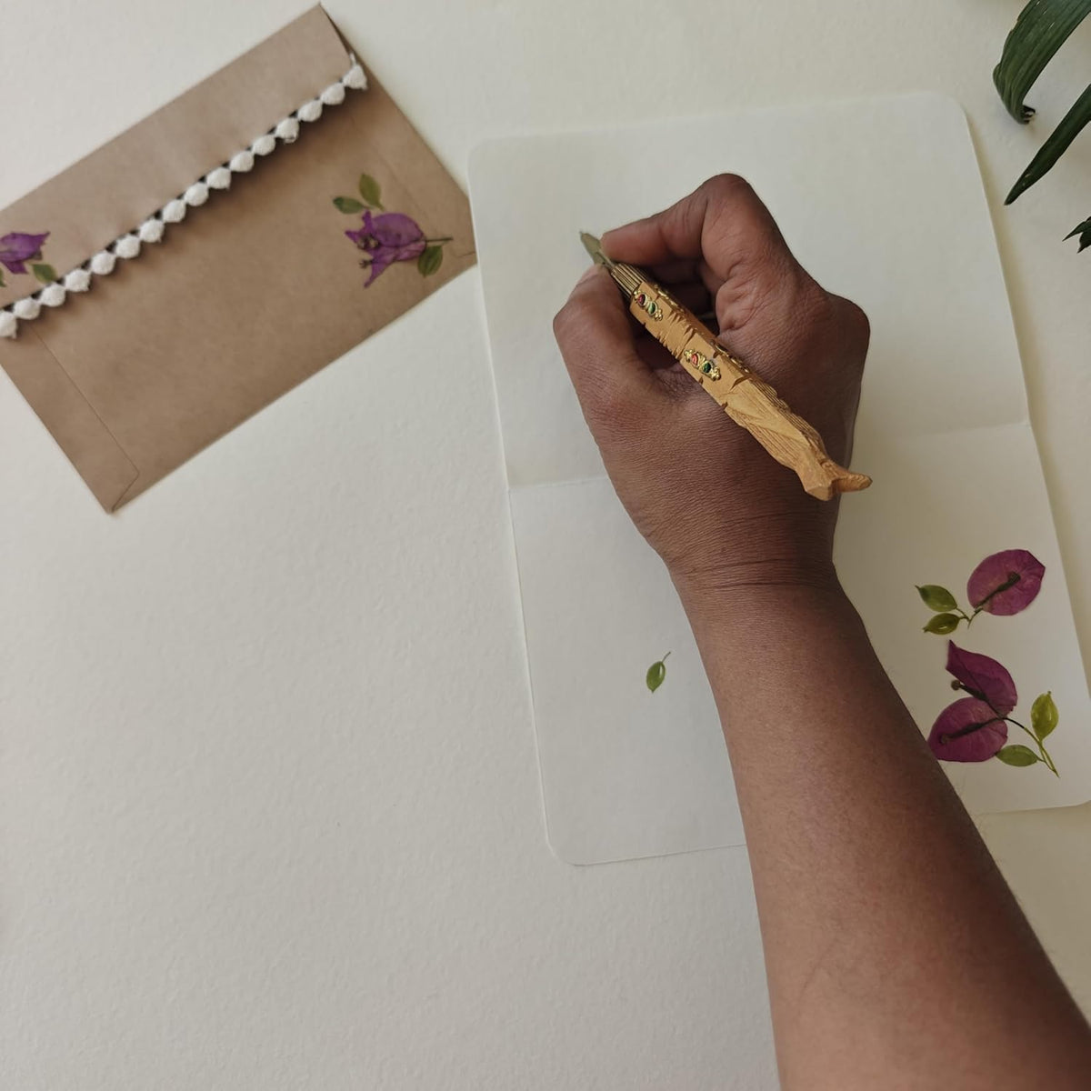 Pressed flower letter paper styled with matching envelope
