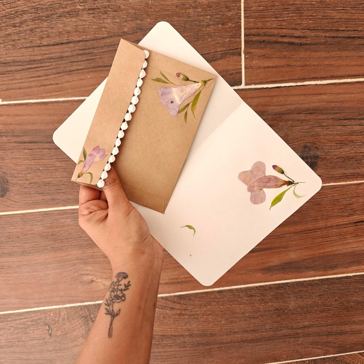 Pressed flower invitation envelope, back view