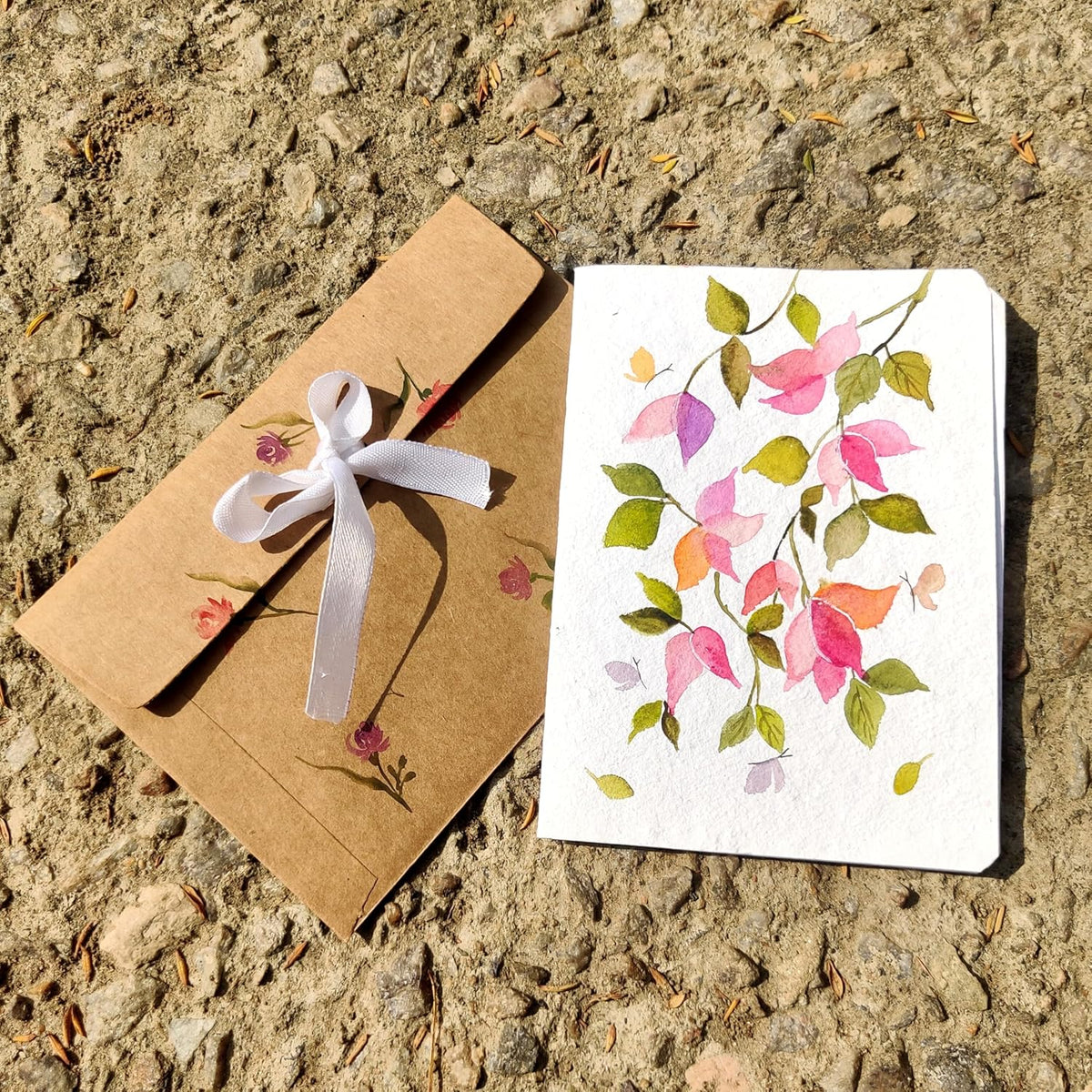Watercolor greeting card styled with matching envelope