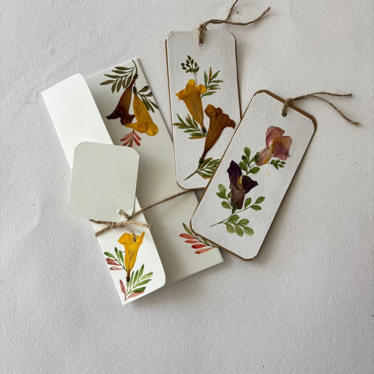 Pressed flower bookmark used in an open book