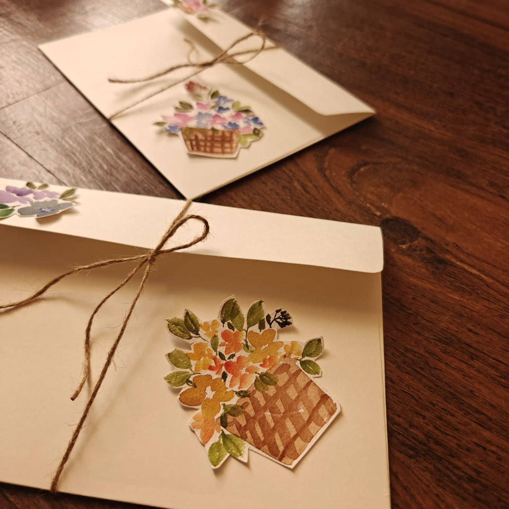 Set of floral basket envelopes in two colour ways – blue and orange florals